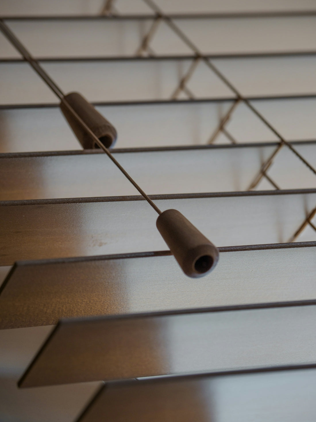 white plastic tube on brown wooden table