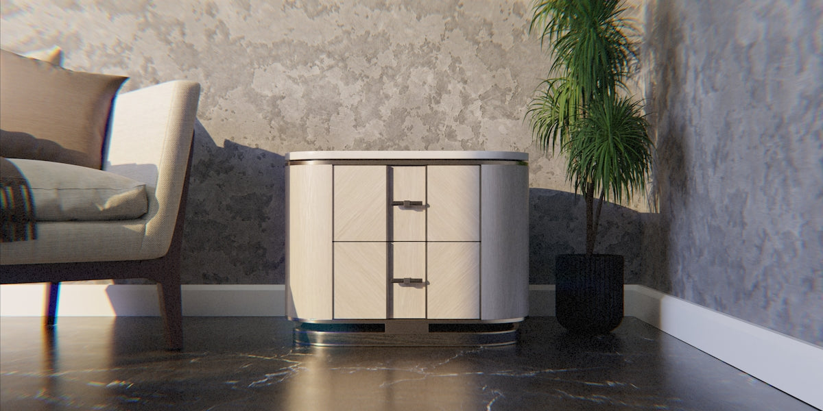 A modern nightstand next to a sofa and potted plant.