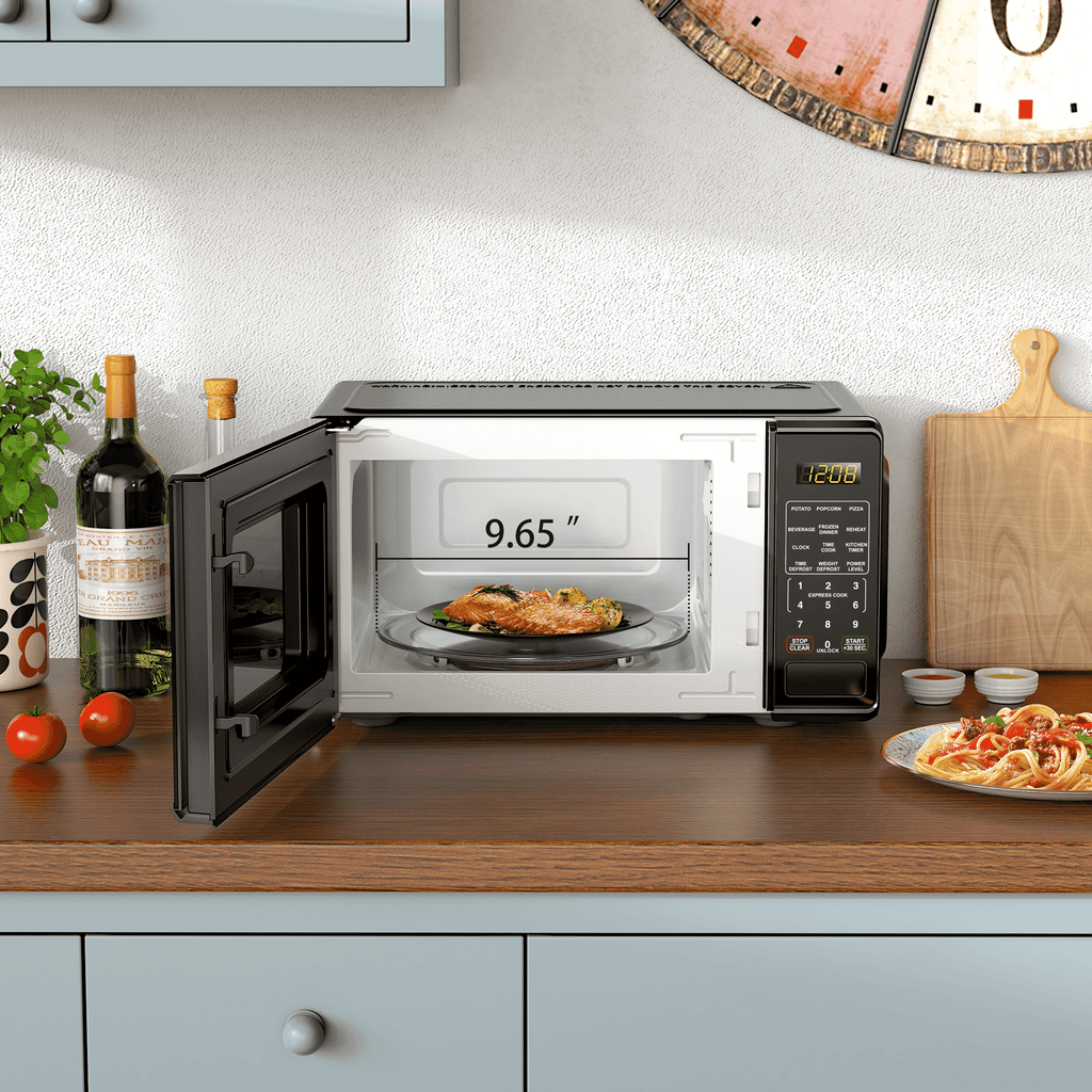 Mainstays 0.7 Cu ft Countertop Microwave Oven, 700 Watts, Black, New