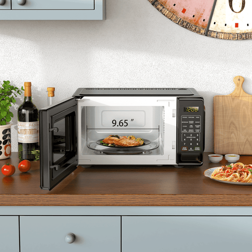 Mainstays 0.7 Cu ft Countertop Microwave Oven, 700 Watts, Black, New